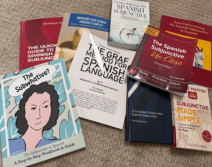 Stack of Spanish subjunctive books